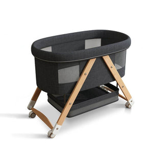 Toddly CuddleCrib Oval 3-in-1 wooden bassinet with foldable design, premium mattress, and breathable mesh sides for newborns up to six months