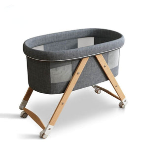 Toddly CuddleCrib Oval 3-in-1 wooden bassinet with premium ergonomic mattress and breathable mesh sides