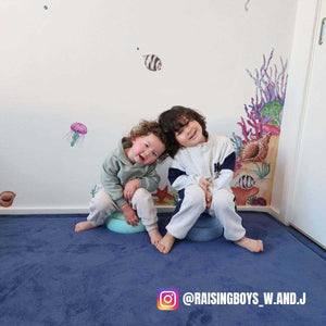 Toddly CushyCrawl V2.0 waterproof memory foam play mat rolled and packaged