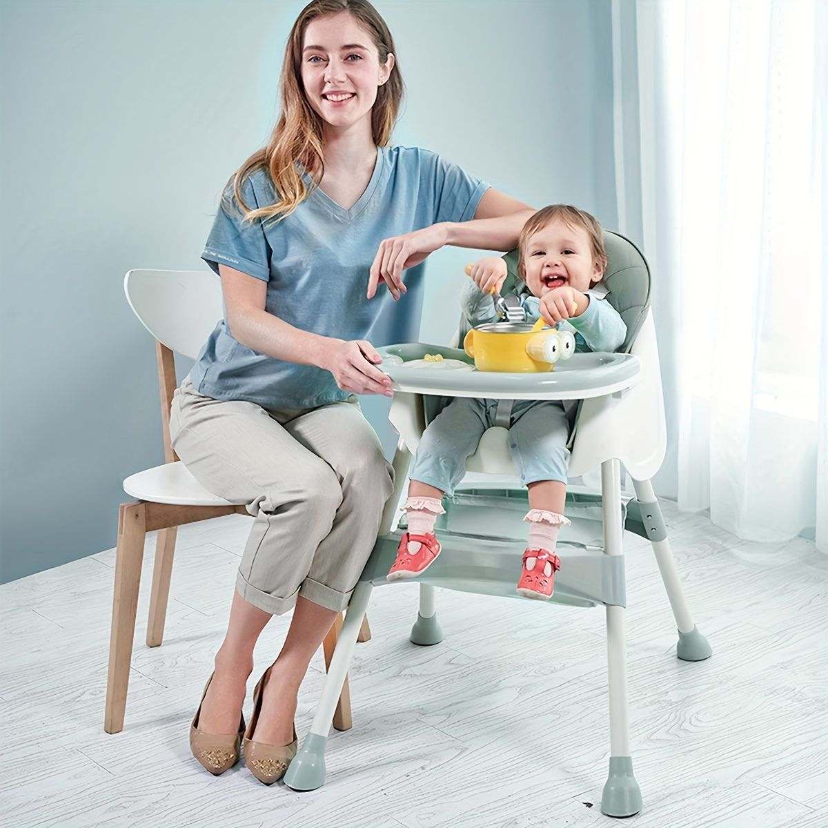 Toddly FlexiGrow 4-in-1 baby high chair with adjustable tray and 5-point harness for safety
