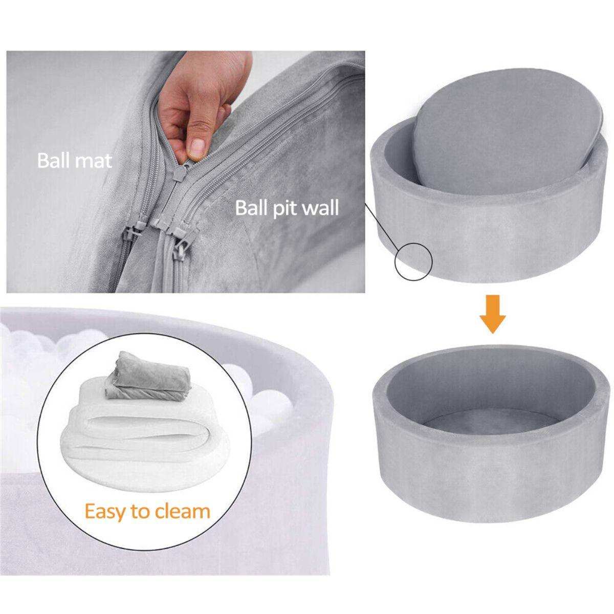 BabiePlay Ultimate Foam Ball Pit foldable grey foam baby play mat with removable cover and wall showing zipper detail for easy cleaning