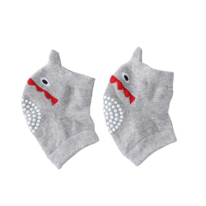 Feather & Fawn CrawlGuard anti-slip grey baby knee pads with shark design and white grip dots