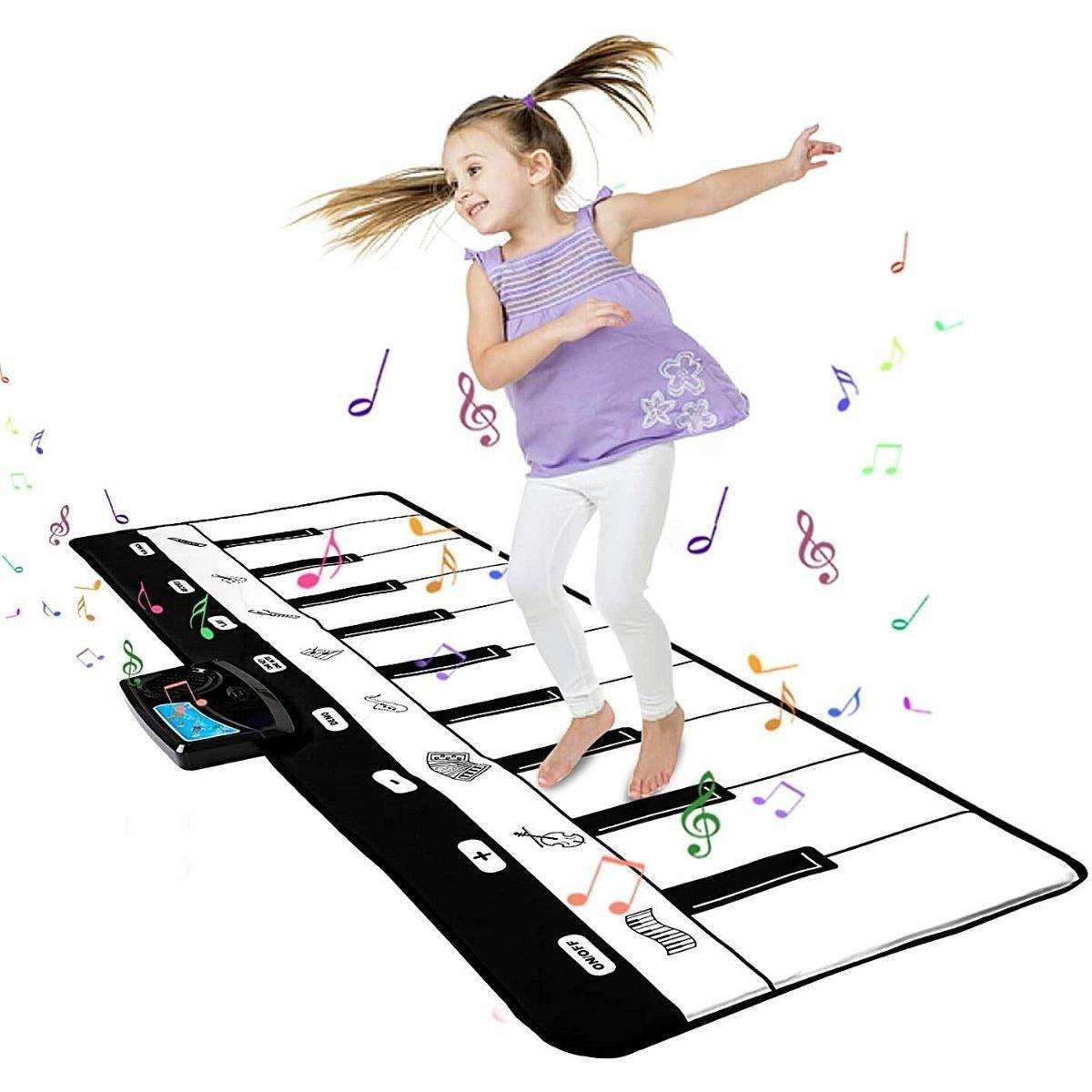 Child playing on Kidst Piano Play Mat musical keyboard dance mat with colorful music notes