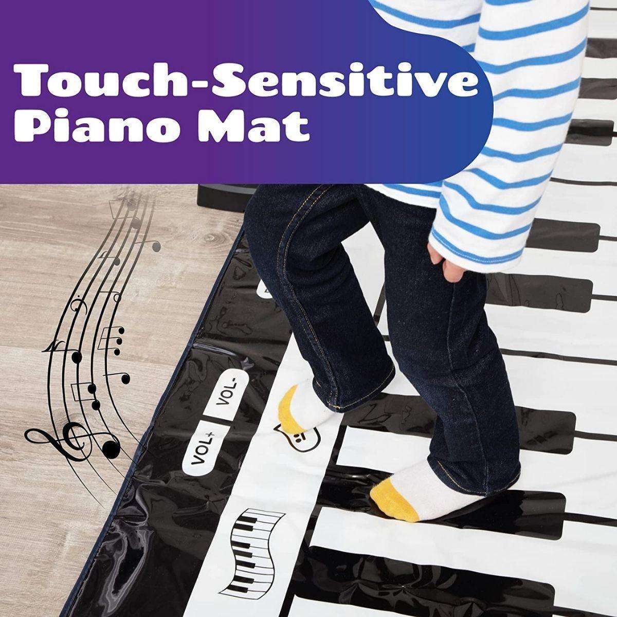 Child playing on Kidst Piano Play Mat musical keyboard dance mat with touch-sensitive keys