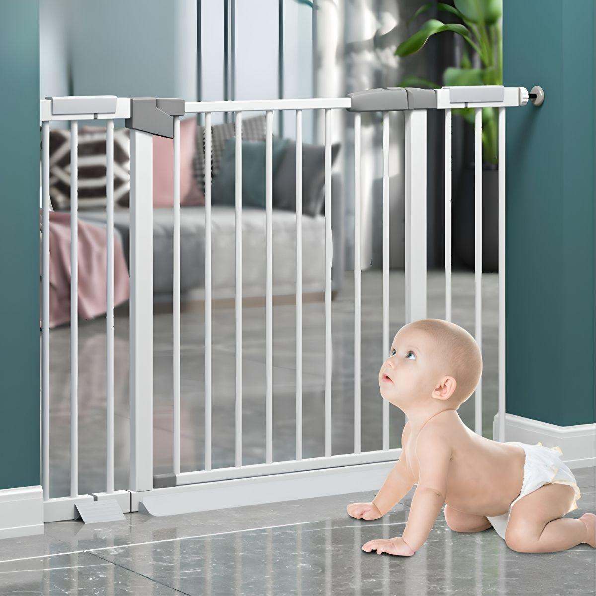 Toddly GuardMate Baby Safety Gate installed in doorway with crawling baby nearby