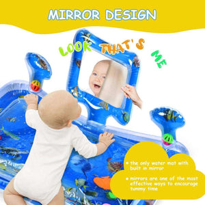 Baby playing on Toddly SplashMirror tummy time water mat with built-in mirror and floating toys for sensory development