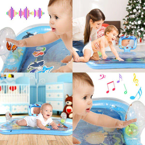 Baby playing on Toddly SplashMirror tummy time water mat with mirror and floating animals for sensory development