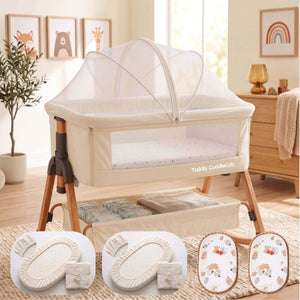 Baby Bassinet & Bedside Co-Sleeper in beige linen-cotton blend with wood-grain frame, mesh sides, mosquito net, and storage basket