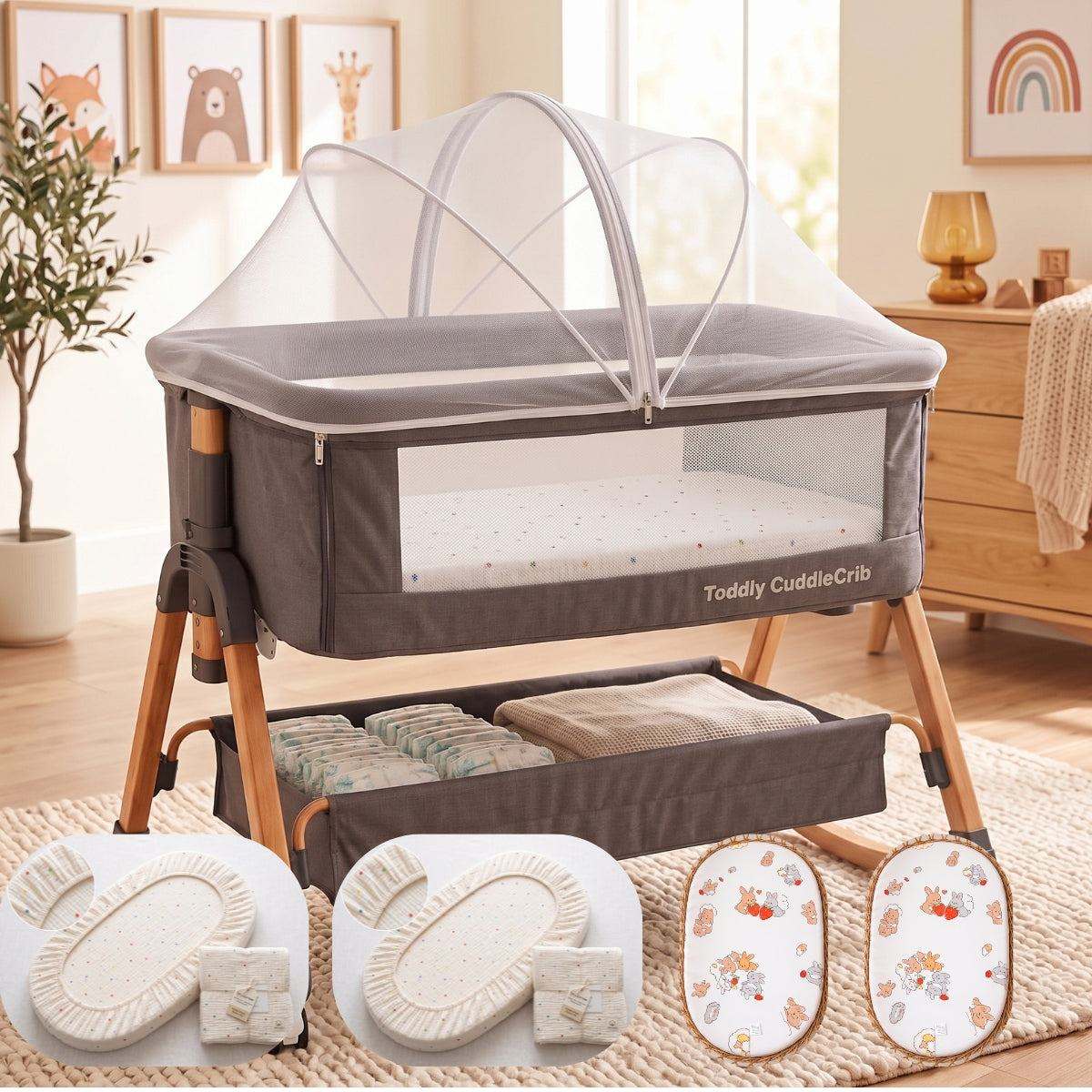 Baby Bassinet & Bedside Co-Sleeper in grey fabric with mesh sides and wood grain frame, featuring a washable mosquito net and under-bassinet storage