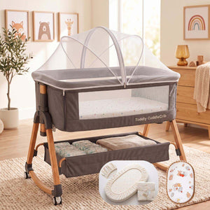 Toddly CuddleCrib V2 Baby Bassinet & Bedside Co-Sleeper in grey with wood grain legs and white mesh canopy