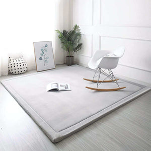 Toddly CushyCrawl V2.0 waterproof memory foam play mat on wooden floor